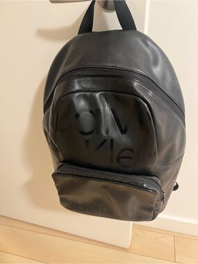 Calvin Klein Matte Black Leather Backpack with Front Zip Pocket